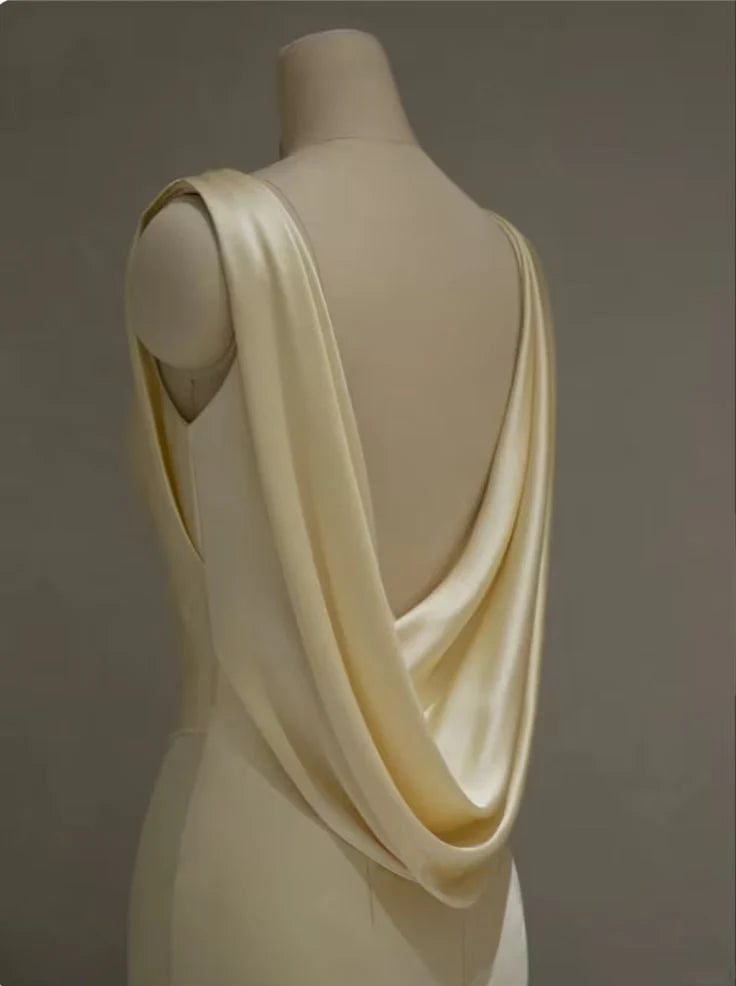 Pastel Yellow Satin Backless Mermaid Long Prom Dress