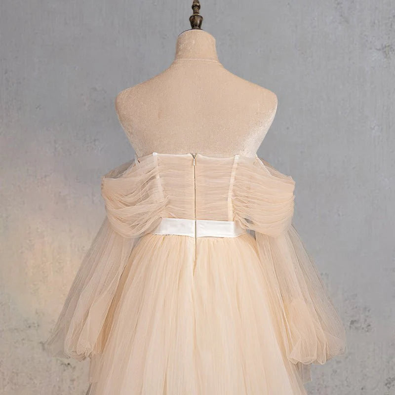 A-Line Champagne Tulle Off-the-Shoulder Long Sleeve Corset Wedding Dress With Sweep Train