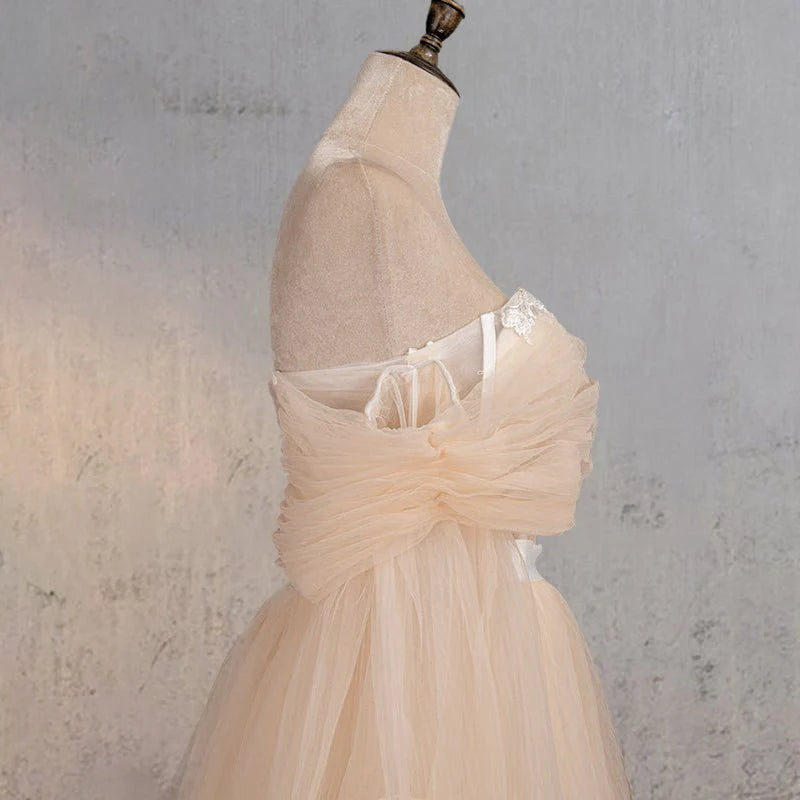 A-Line Champagne Tulle Off-the-Shoulder Long Sleeve Corset Wedding Dress With Sweep Train