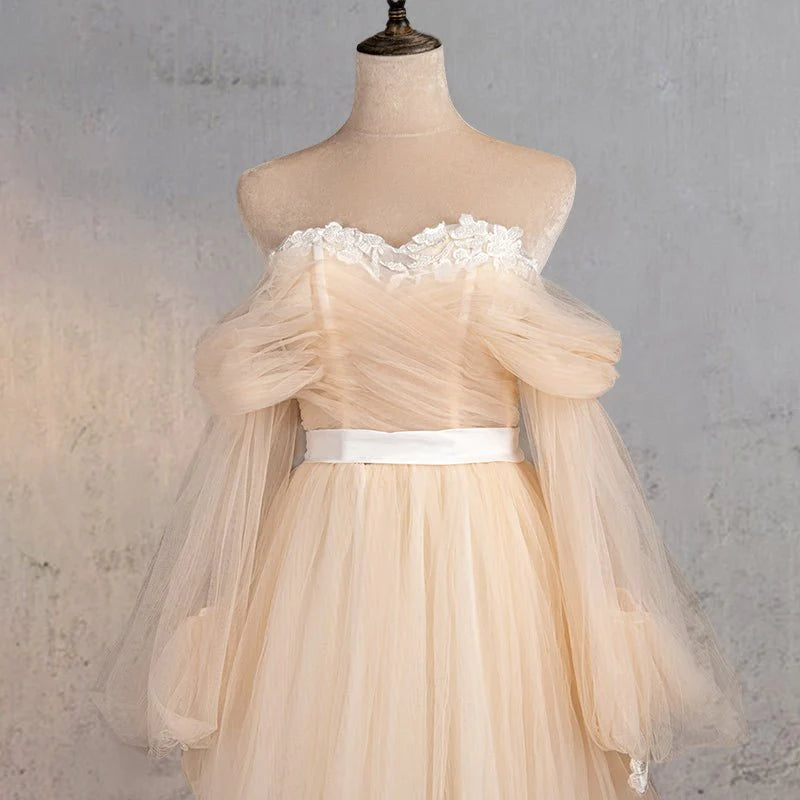 A-Line Champagne Tulle Off-the-Shoulder Long Sleeve Corset Wedding Dress With Sweep Train