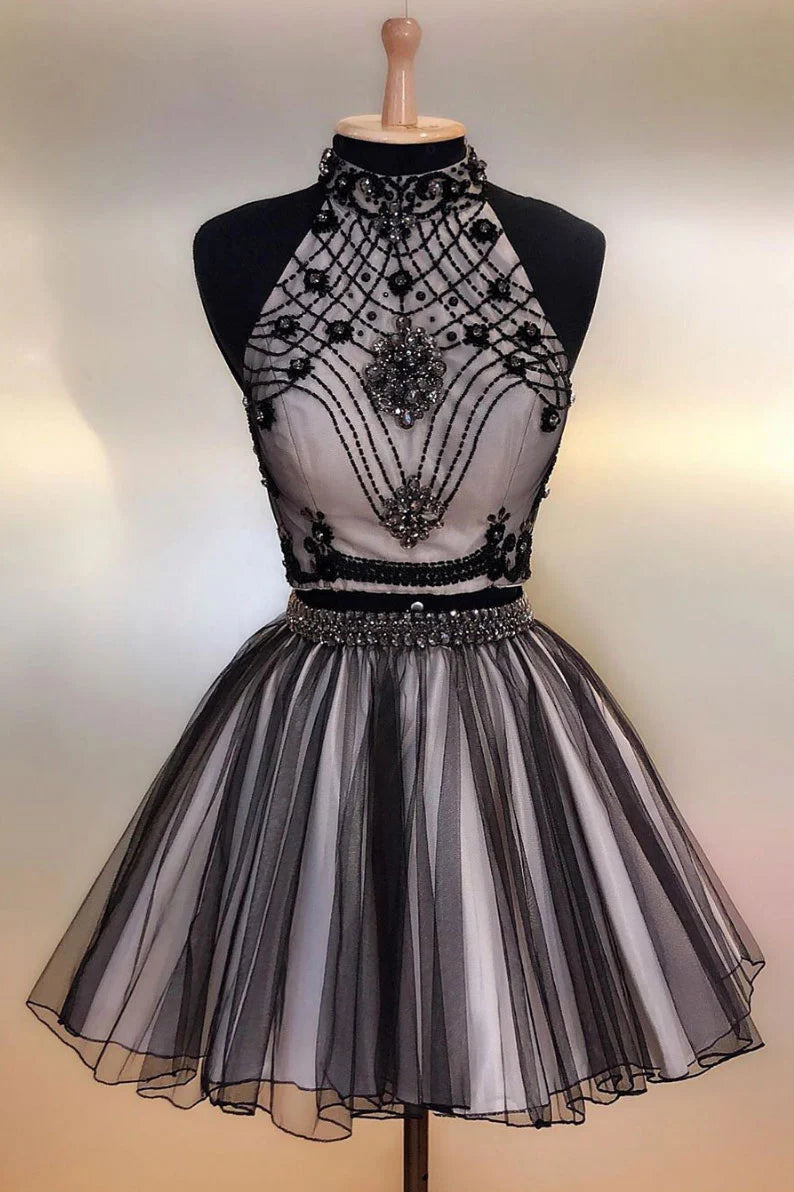 Elegant black A-line short tulle dress with intricate beadwork, perfect for prom or homecoming.