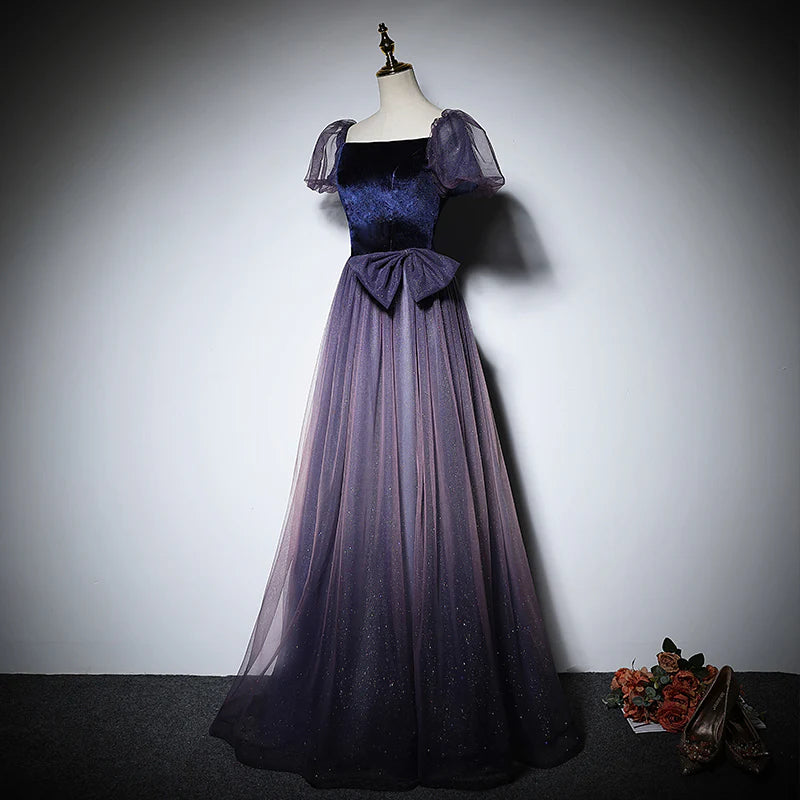 Close-up of the elegant back strap and delicate tulle fabric on the starry sky dress.