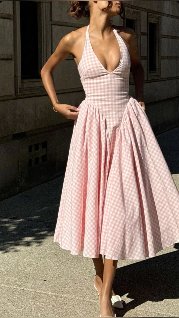 Detail of the plaid pattern and satin fabric on the evening gown.