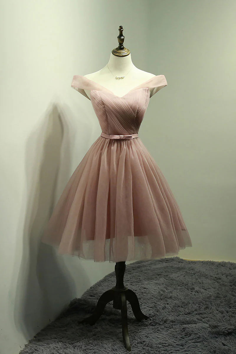 Model wearing a pink off-shoulder short tulle prom dress.