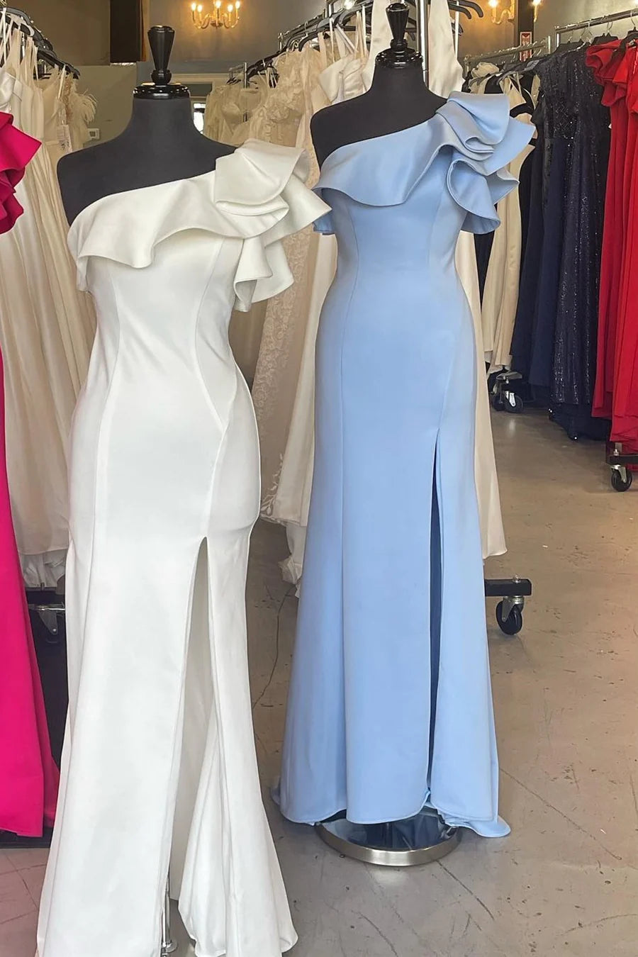 Back and side view of the one-shoulder ruffled mermaid gown, highlighting the silhouette.