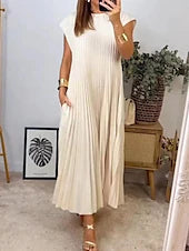 Woman wearing a chic pleated crew neck midi dress.