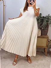 Woman modeling a versatile sleeveless pleated midi dress.