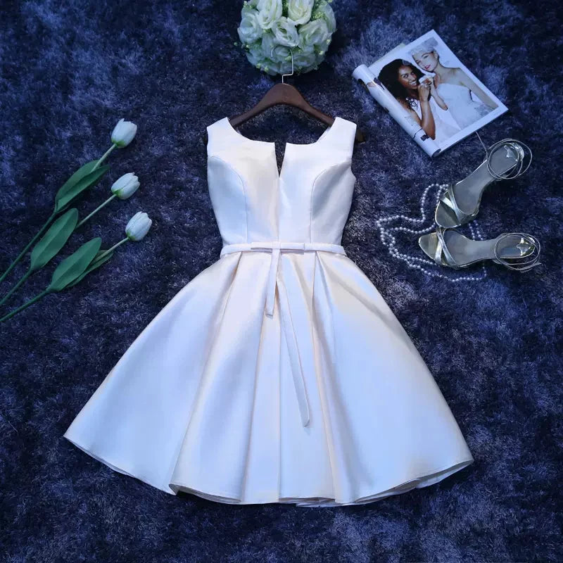 Front view of a chic sweetheart A-line satin mini homecoming dress.