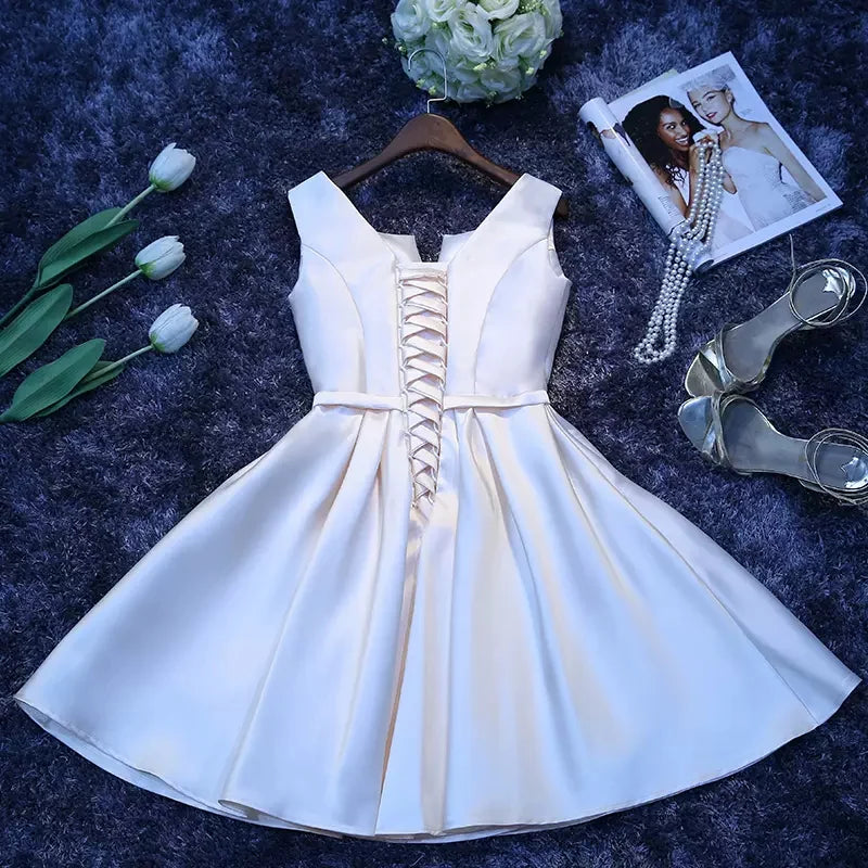 Back view of the sleeveless satin homecoming dress.