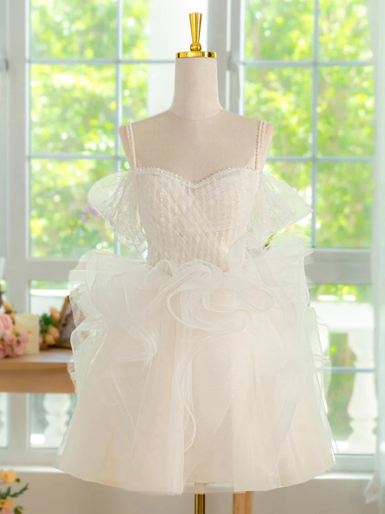 Front view of an ivory tulle and lace short ball gown dress.