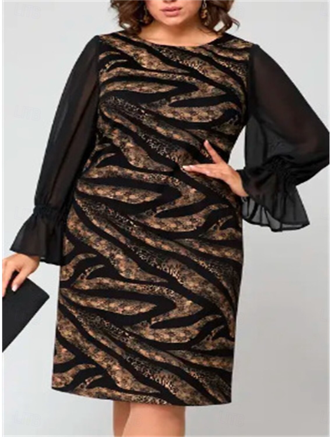 Side view of woman in a comfortable long sleeve midi dress.