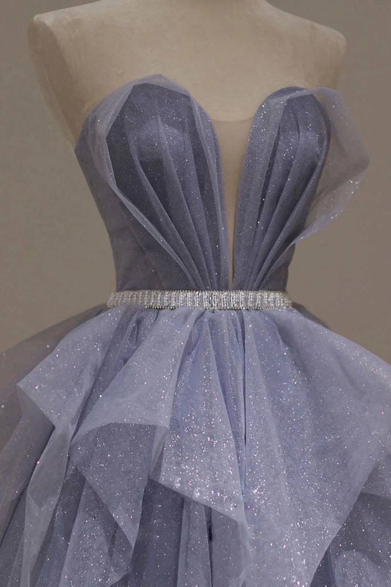 Model showcasing the back and side of a purple sequin off-shoulder formal gown.