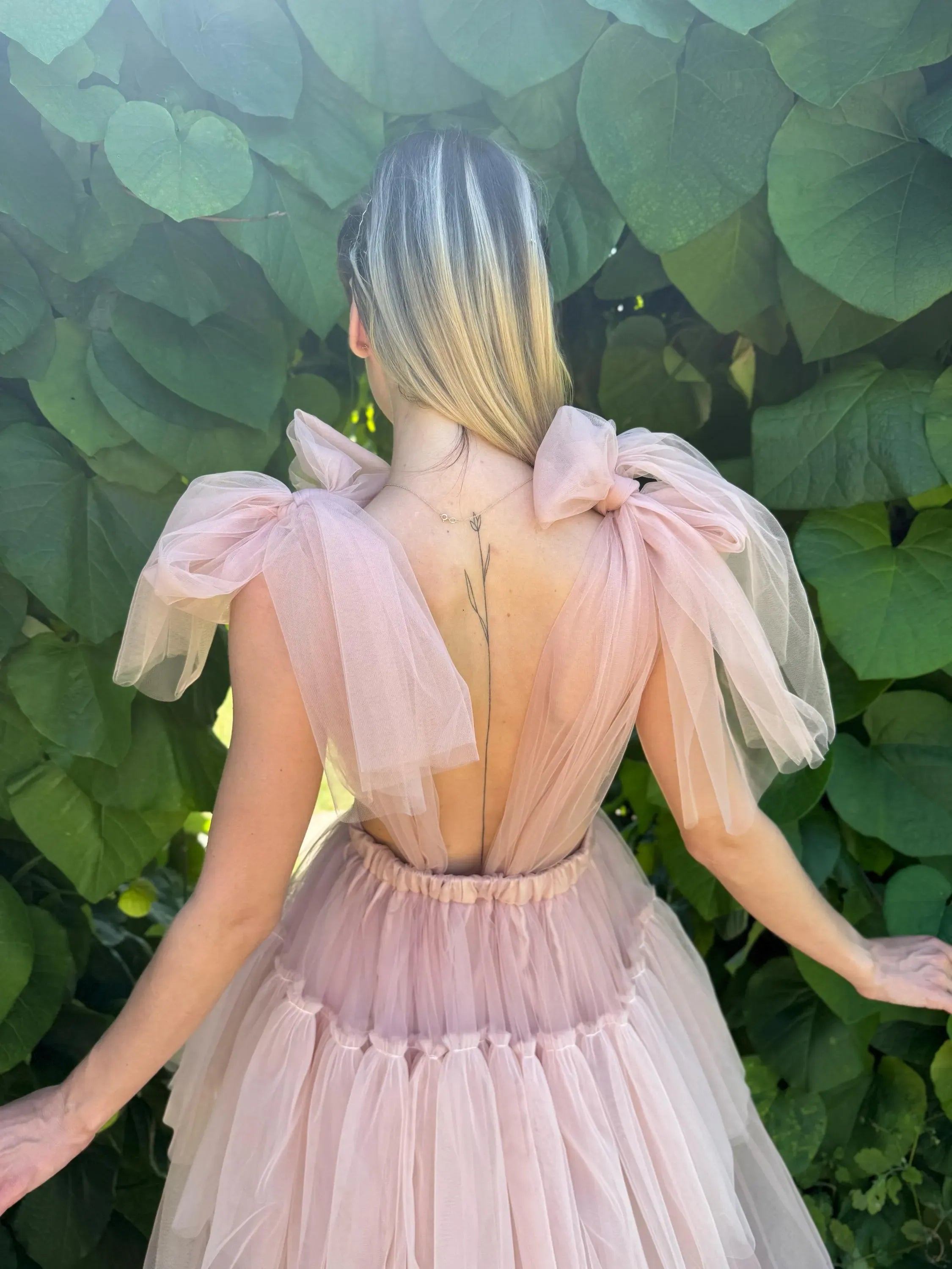Dreamy A-Line V-Neck Bow Cutout Tiered Low Back Blush Floor-Length Prom Dress