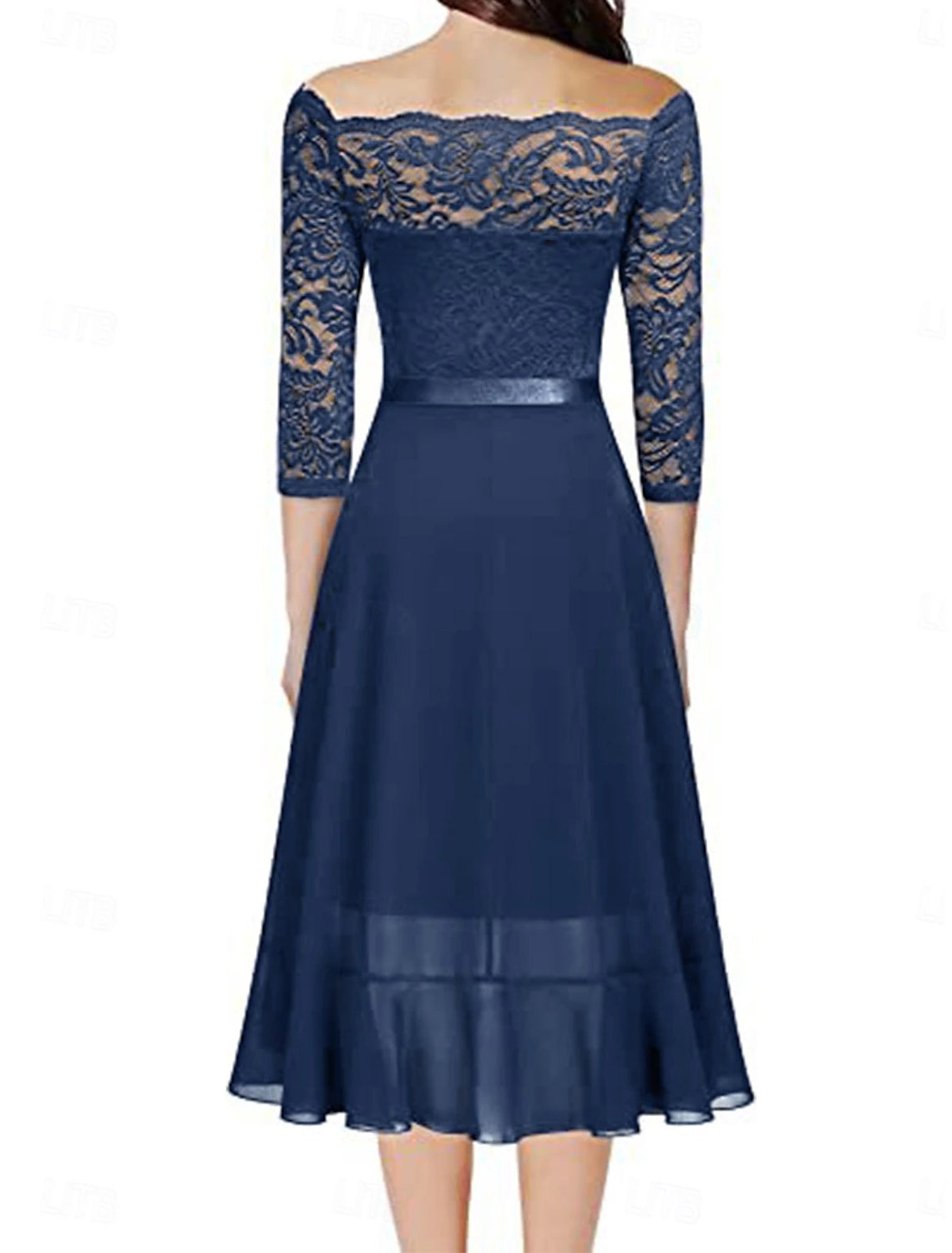 Side view of a woman wearing a blue A-line lace dress with half sleeves.