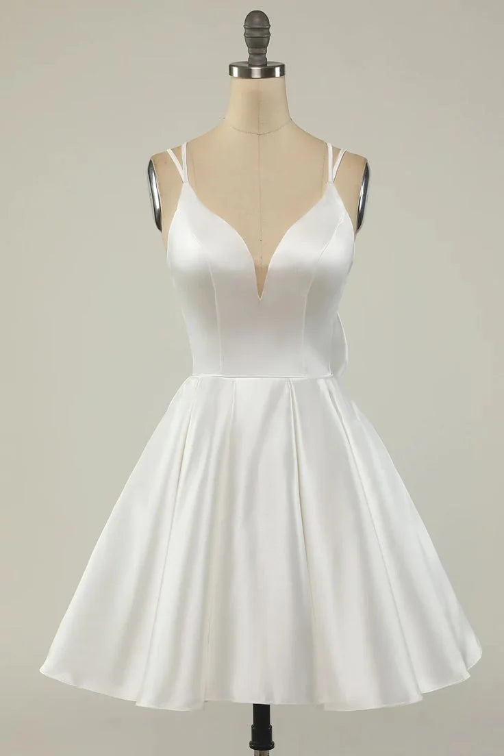 Model wearing a white satin short homecoming dress with double straps.