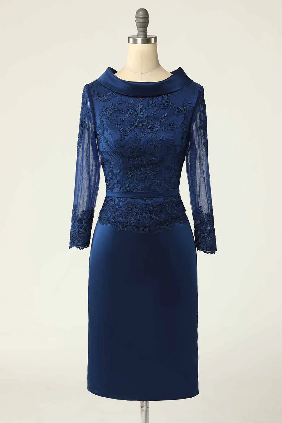 Model wearing an elegant navy blue high-collar short dress with an embroidered bodice, front view.