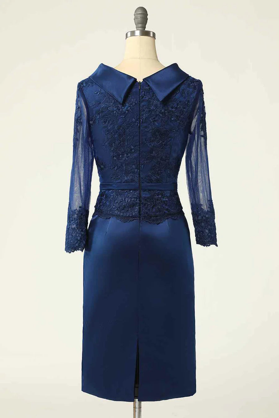 Side view of the navy blue high-collar short dress with intricate embroidery on the bodice.