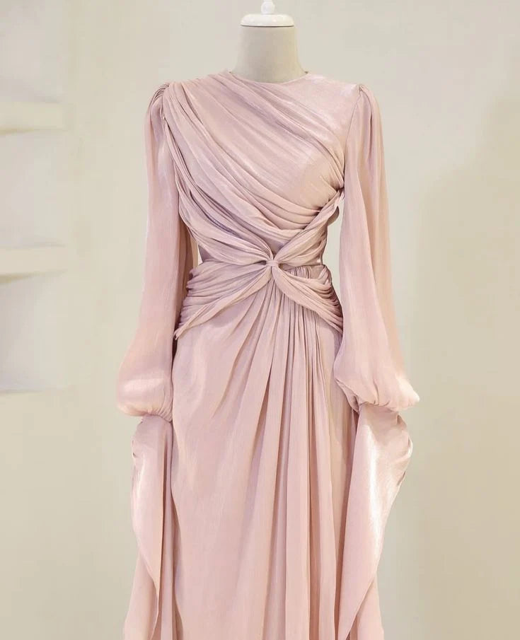 Close-up of the bodice and long sleeves of the A-line prom gown.