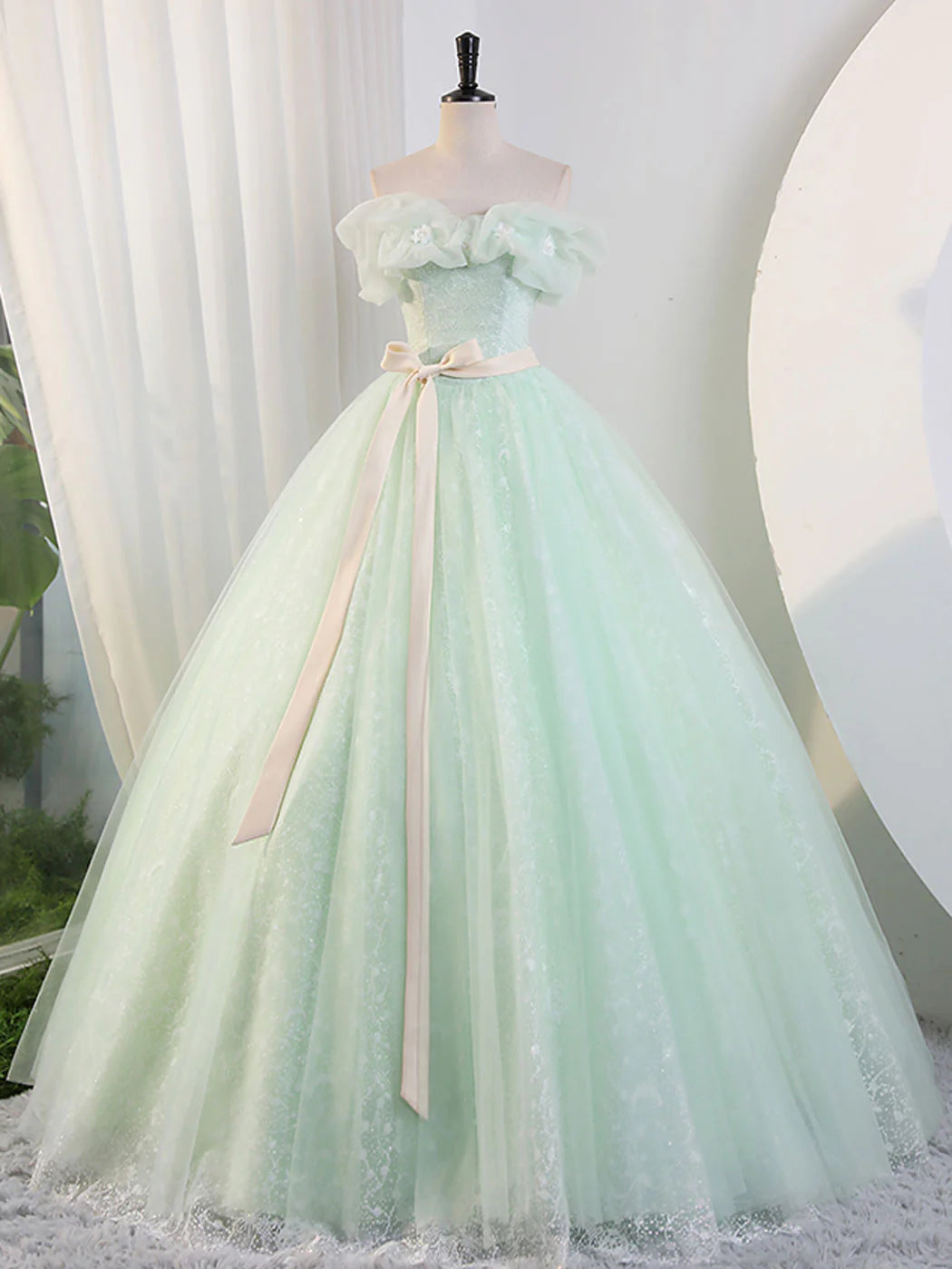 Elegant A-line off-shoulder green long prom dress.