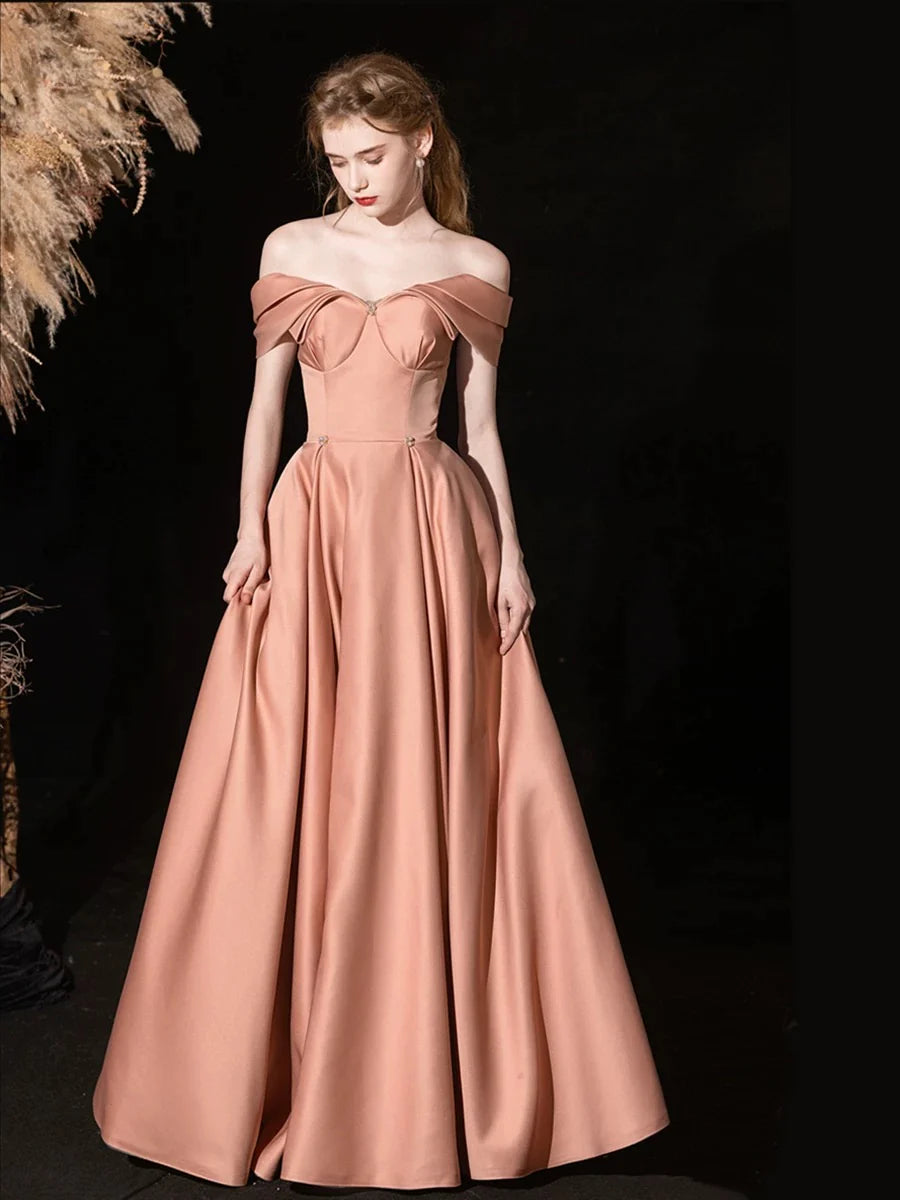 Elegant A-line off-shoulder satin pink long prom dress.