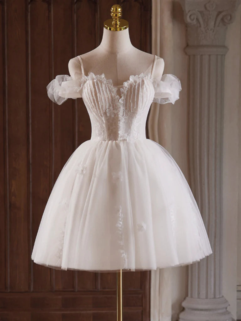 Model wearing a light champagne off-shoulder sweetheart neck homecoming dress with tulle and lace details.