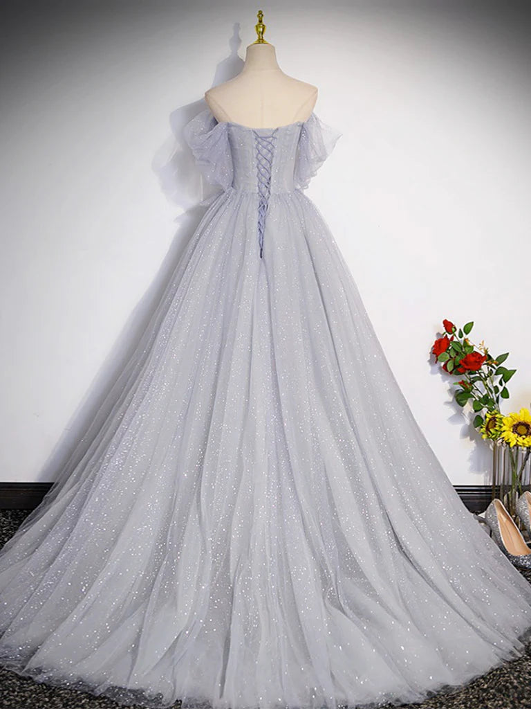 Back view of the long gray off-shoulder tulle evening dress.