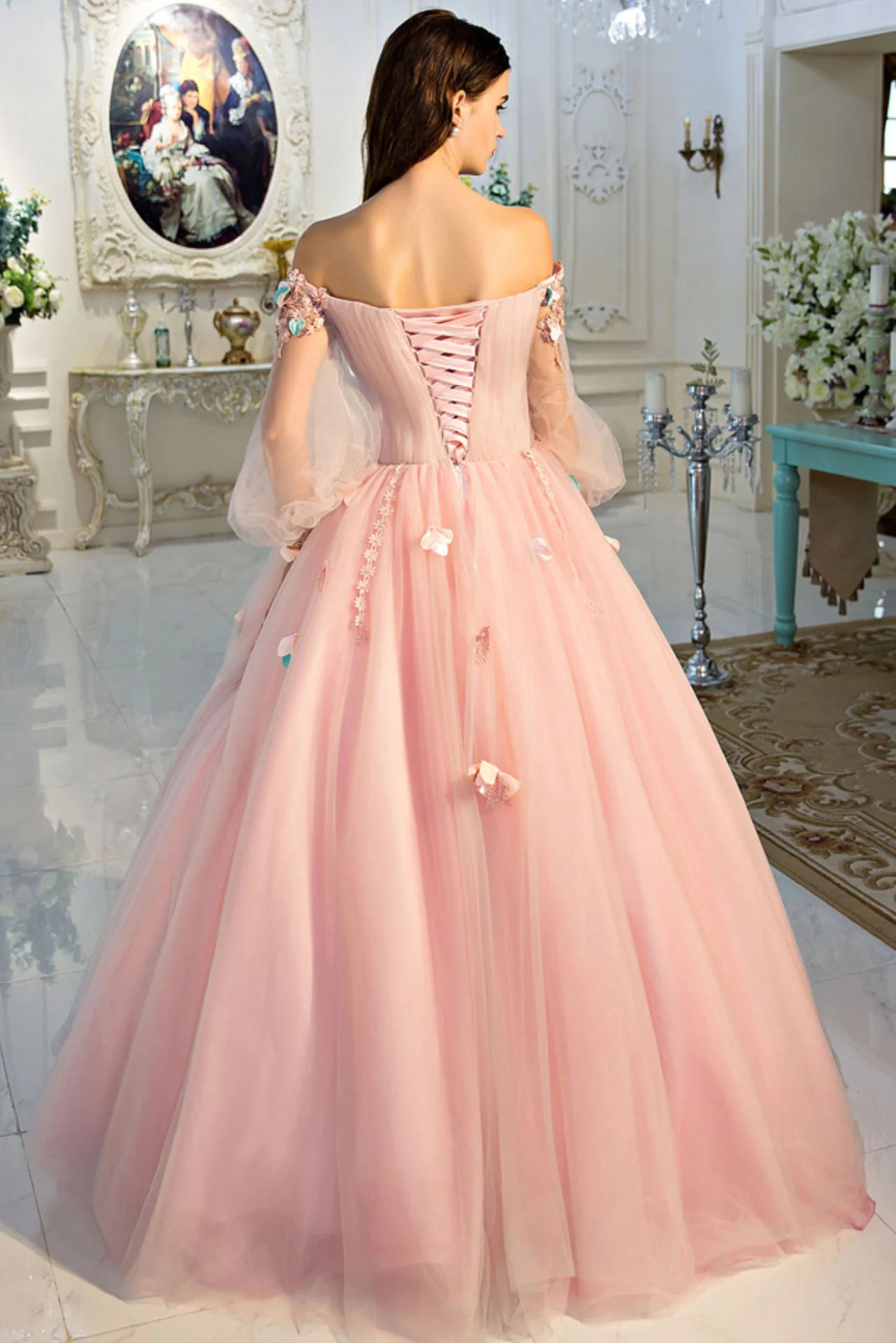 Close-up of the pink off-shoulder tulle long dress details.