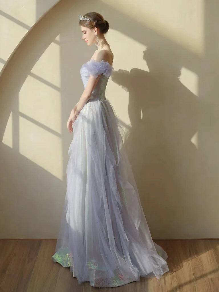 Back view of the flowing tulle skirt and elegant silhouette of the purple A-line long dress.