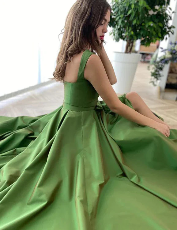 Side view of the A-Line Princess satin evening dress, highlighting ruffles and train.
