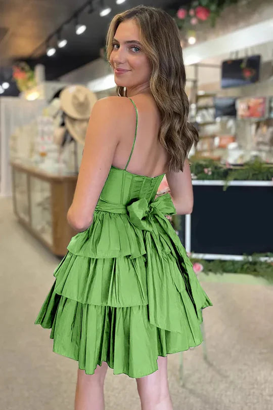 Model in a different pose, featuring the elegant A-line spaghetti strap dress.