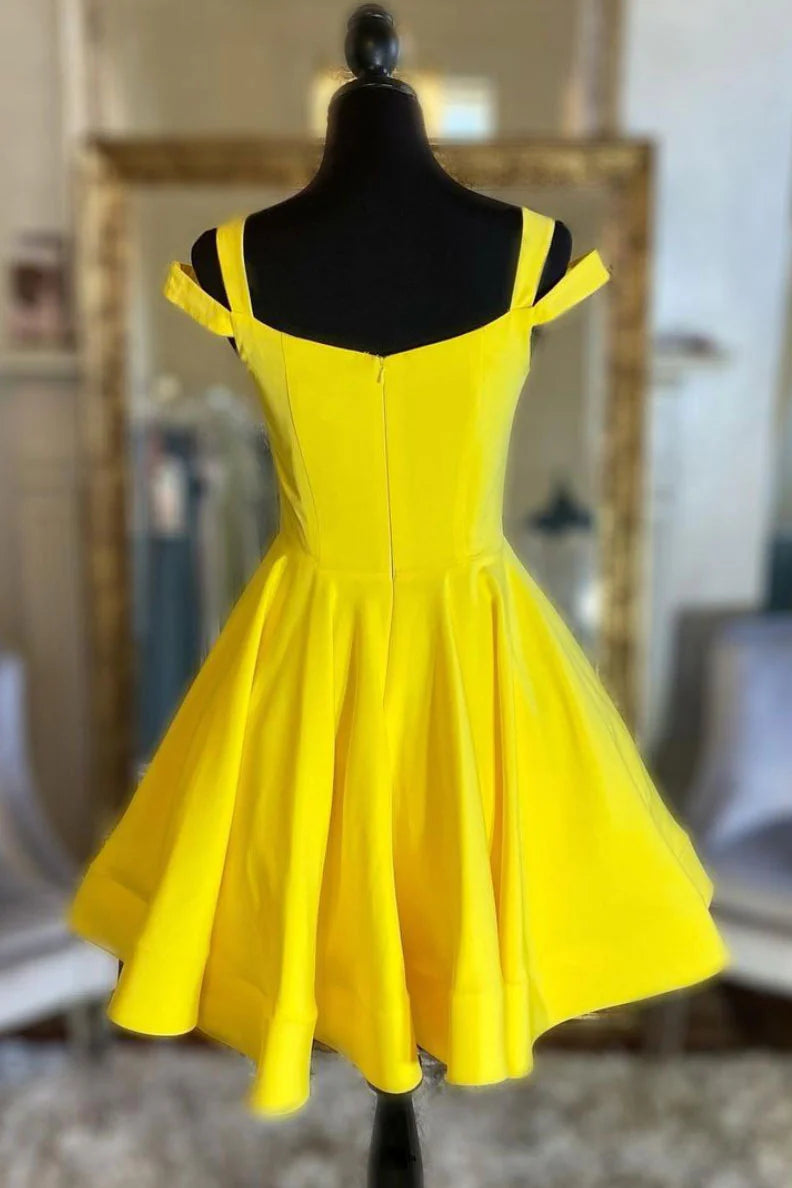 Back view of a model in a chic yellow satin short cocktail dress, showcasing the tailored fit.