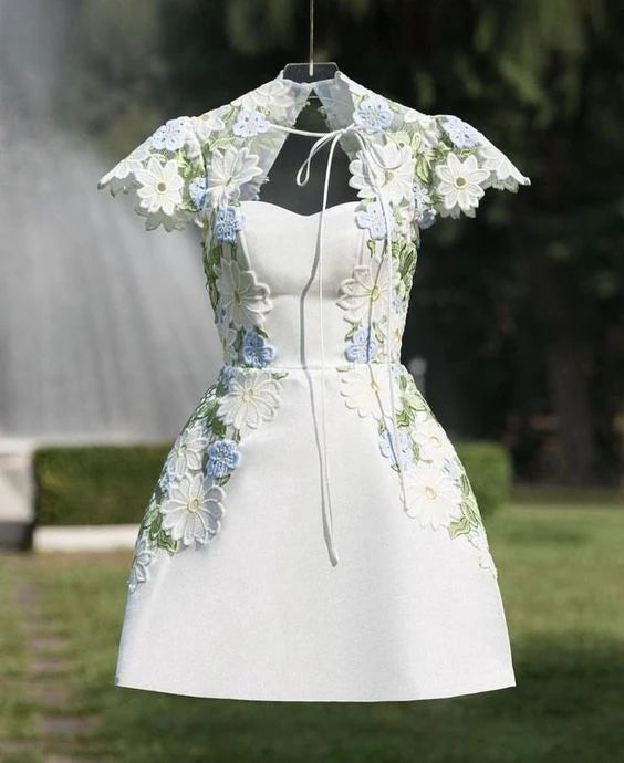 Front view of an A-line short sleeve floral lace short homecoming dress.
