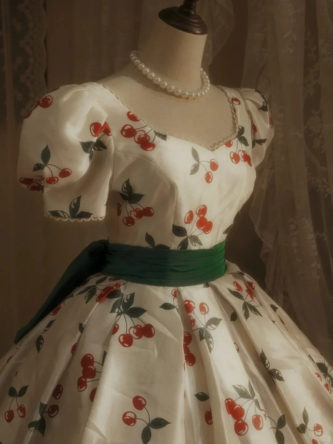 Close-up of the embellished bodice and full skirt of the princess dress.