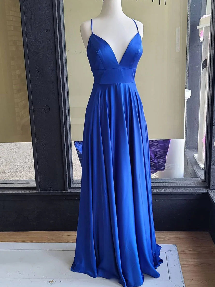 Blue satin A-line evening gown with spaghetti straps, side view.