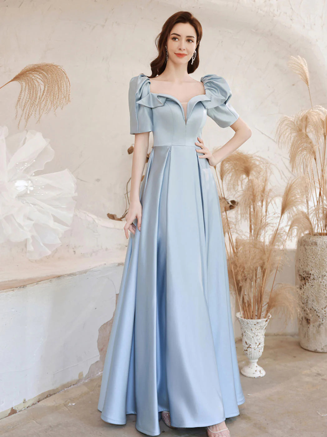 Back view of the blue A-line square neck prom dress.