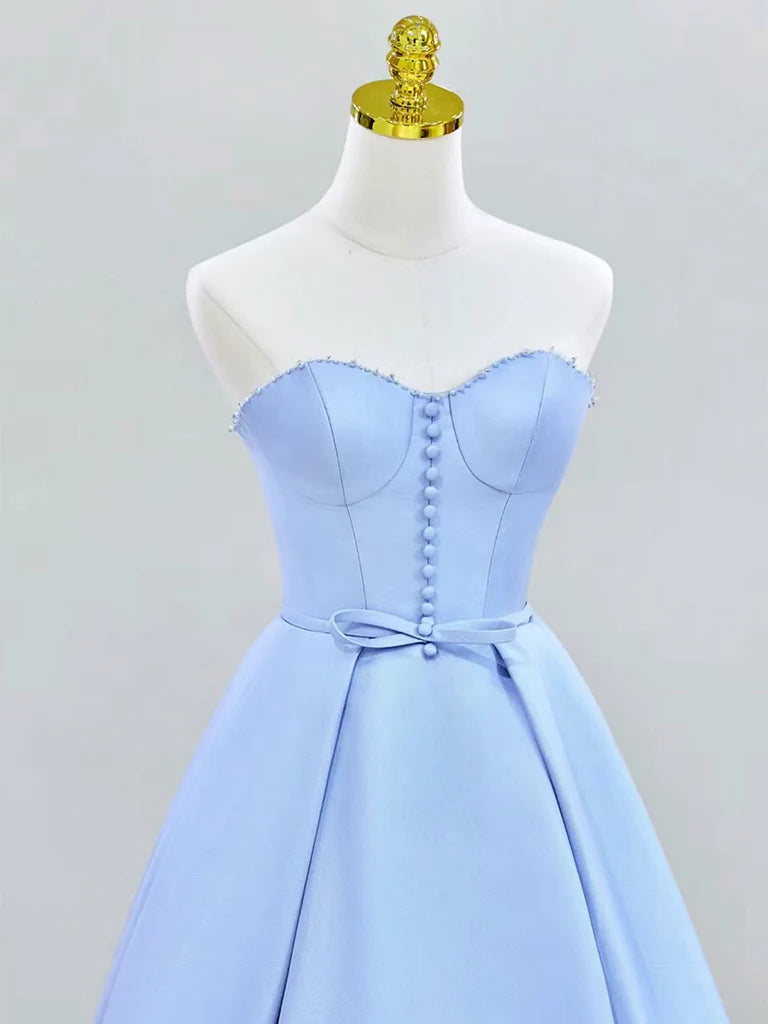 Back view of a blue A-line satin long formal dress.