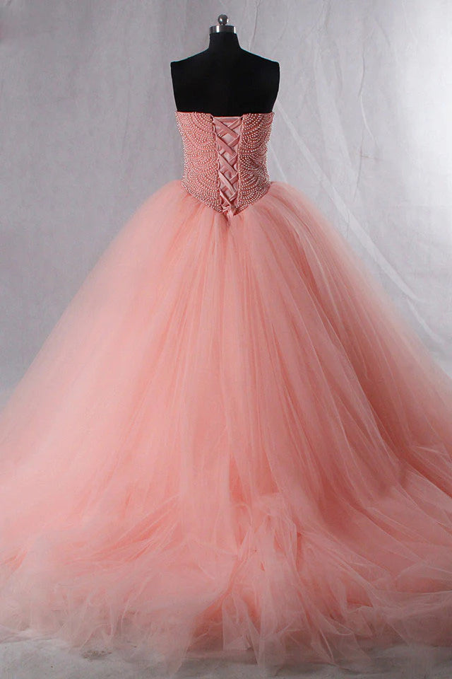 Back view of the elegant pink tulle prom gown.