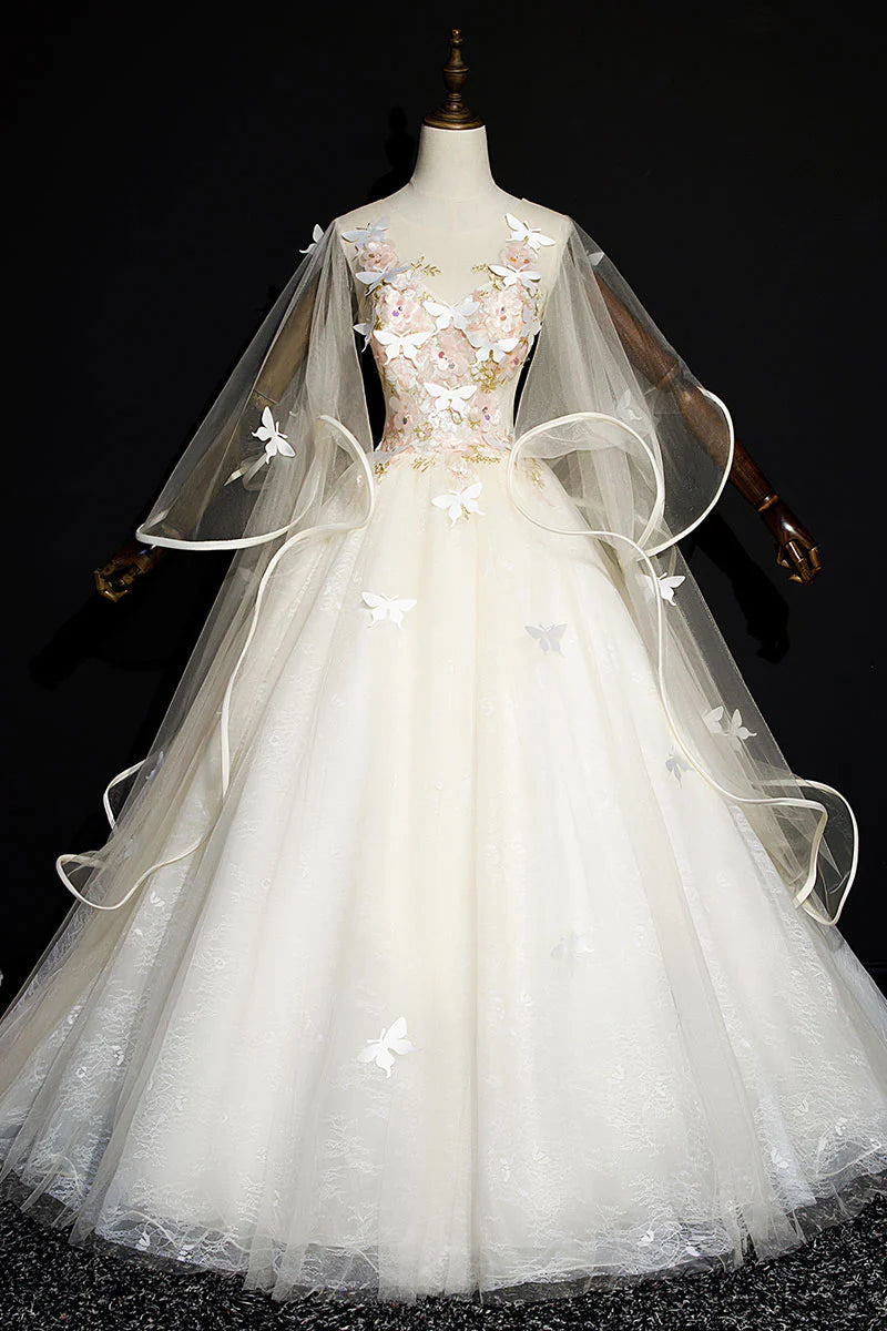 Full length view of an elegant light champagne tulle lace Sweet 16 dress.