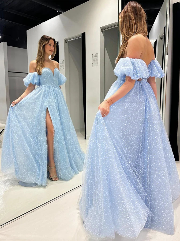 Back view of a blue A-line sweetheart neck tulle long formal gown.