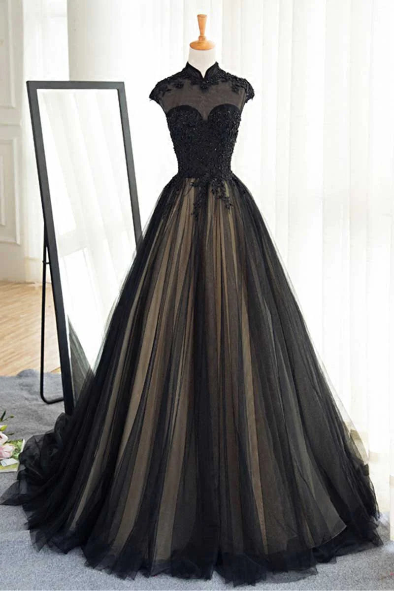 Model wearing an elegant black tulle lace sleeveless A-line prom dress.