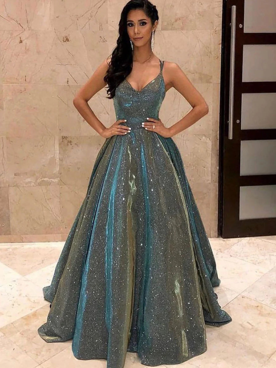 Woman wearing an elegant gray A-line V-neck long prom dress with spaghetti straps.