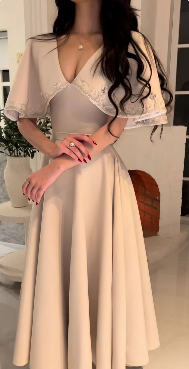 Back view of the elegant A-line prom dress, showcasing its flowing skirt.