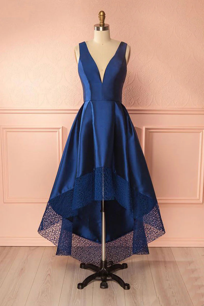 Model wearing a dark blue A-line V-neck high-low prom dress.