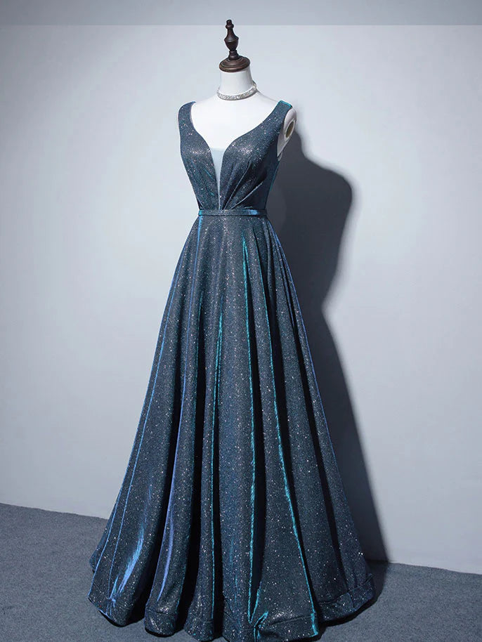 Back view of a woman wearing an A-line V-neck satin blue long formal dress.
