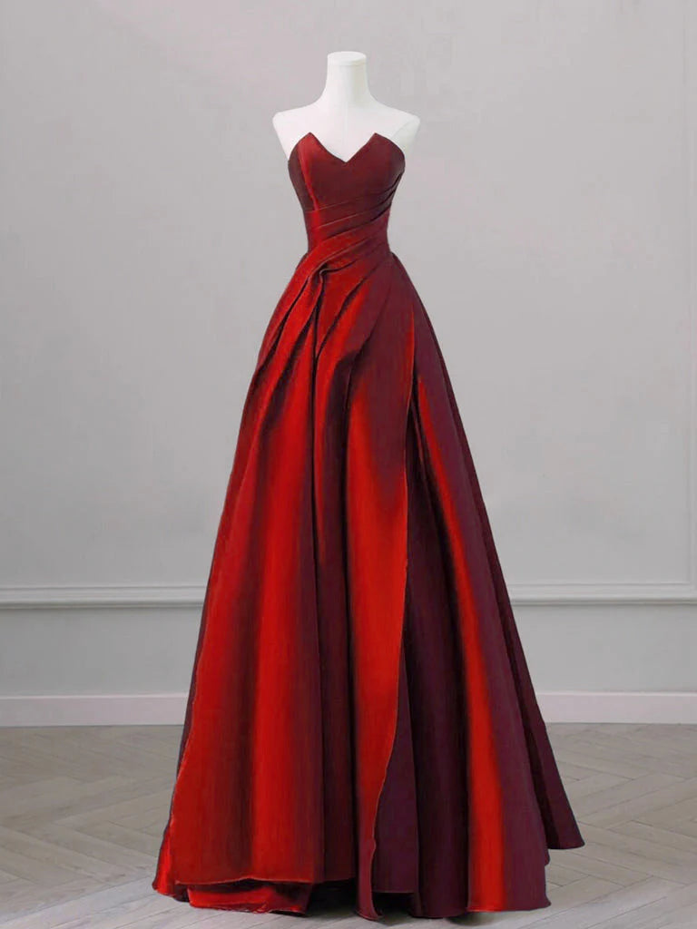Model wearing a burgundy A-line V-neck satin long prom dress.