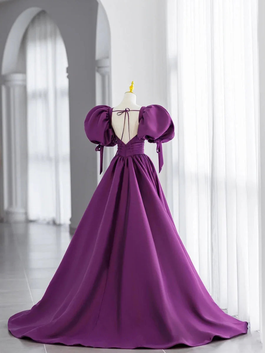 Model wearing an elegant purple V-neck satin long prom dress, front view.