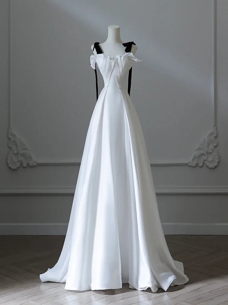 Model wearing an elegant white A-line satin long prom dress, front view.
