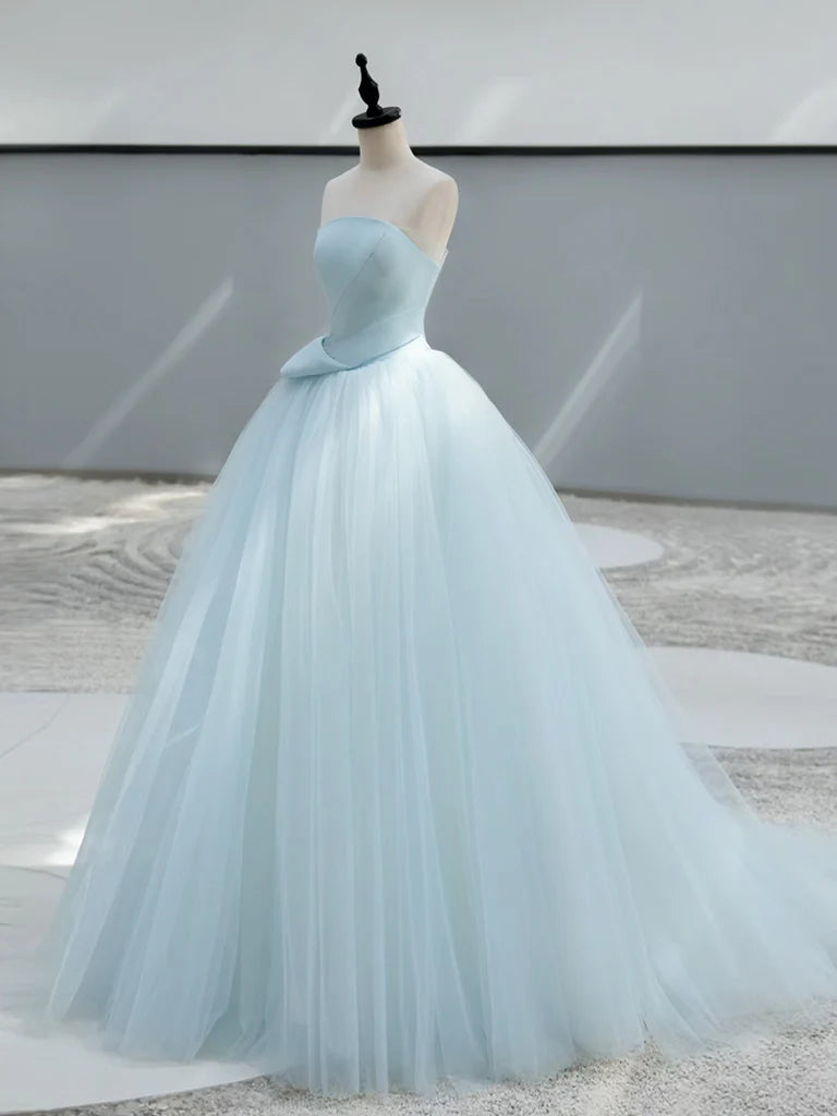 Elegant blue A-line satin tulle prom dress on a model.