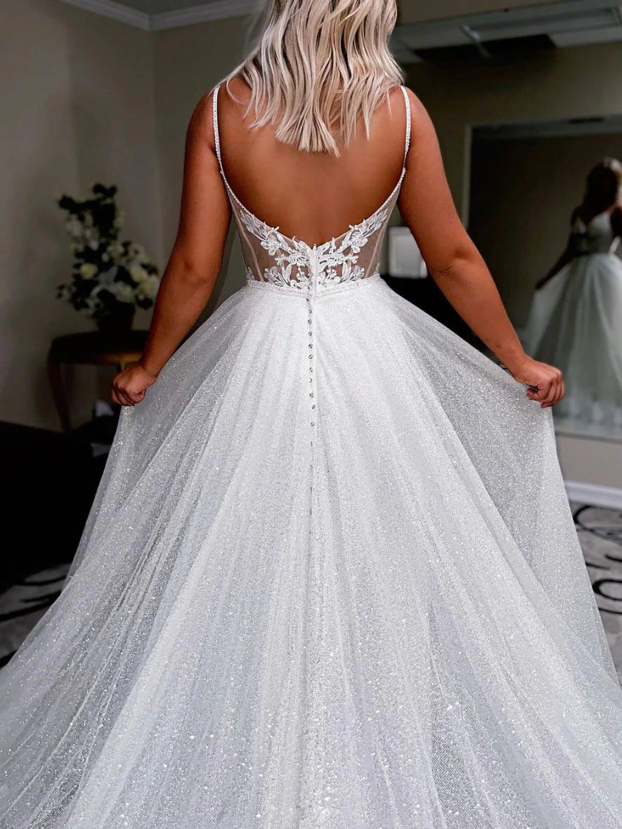 White V-neck sequin tulle floor-length formal dress on a model.