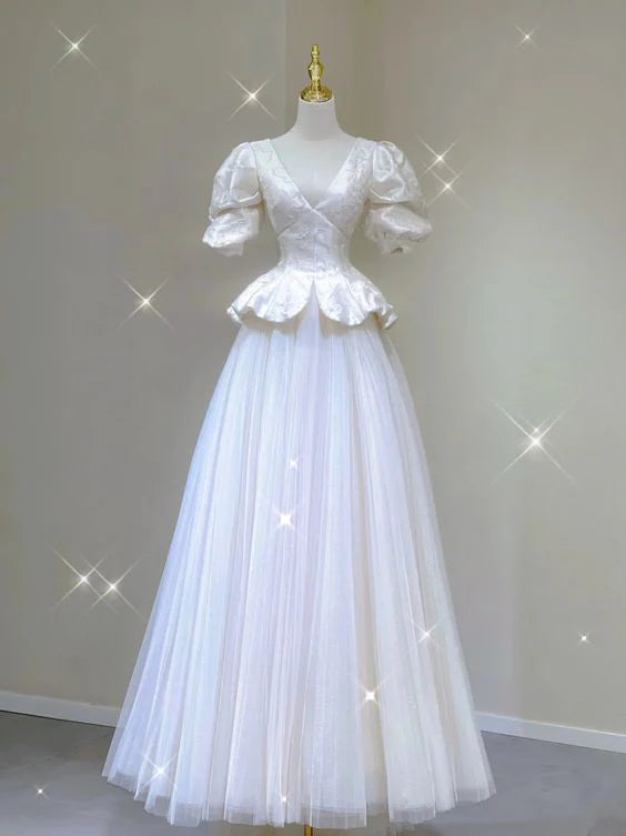 White satin V-neck short sleeve floor-length prom dress.